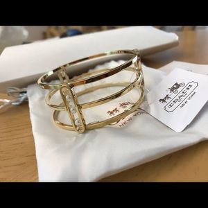 Coach gold bangle with pearls